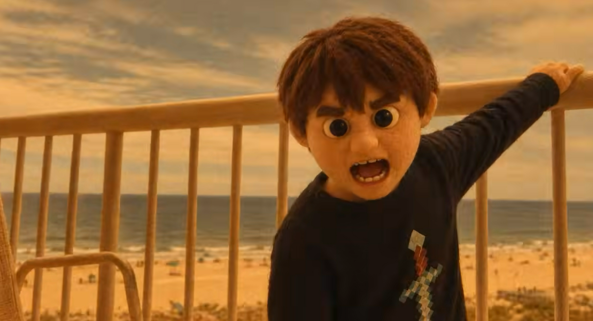 Stop-motion puppet character standing on a beachfront balcony